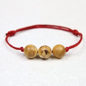 Bracelet en Bouleau madré avec fil rouge