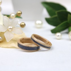 Duo of wedding rings in spotted Maple and Dumortierite.